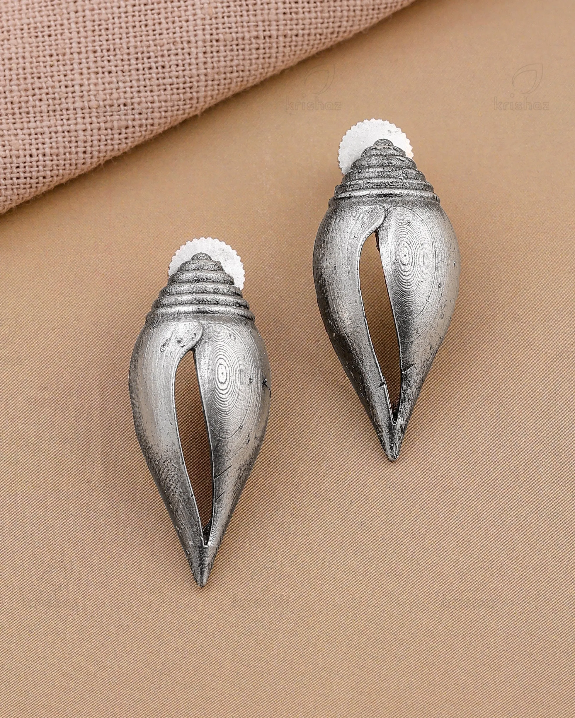 Shelly Shell Shaped Studs.